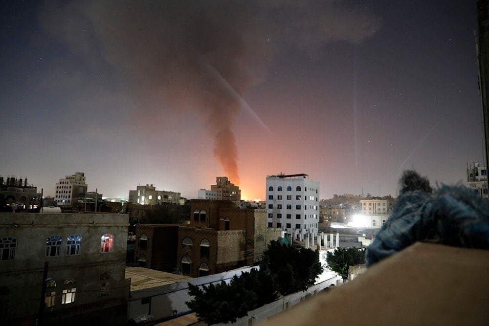 Smoke rises after the US-UK-led airstrikes on hit targets in Sanaa, Yemen, Sunday, Feb. 25, 2024. (AP)