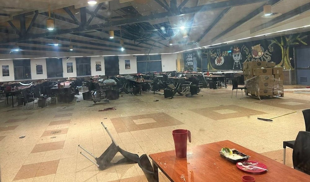 Dinning hall of the Israeli occupation's Binyamina military base, occupied Haifa, Palestine, after it was struck by a drone launched by the Islamic Resistance in Lebanon on October 13, 2024. (Social media)