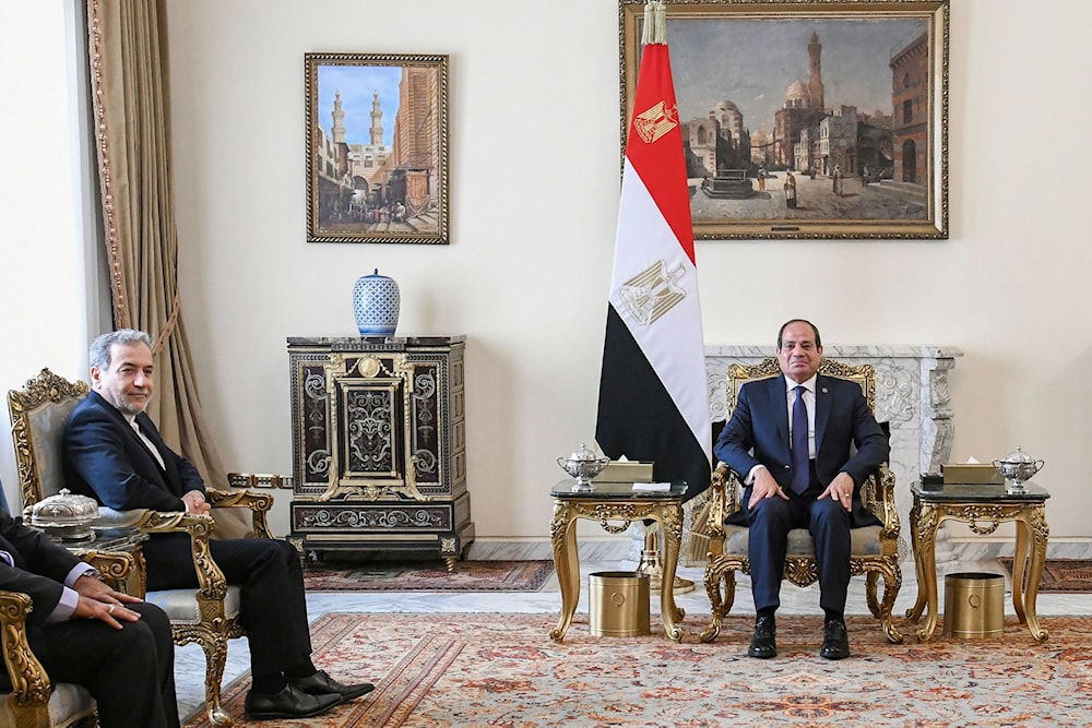 In this photo provided by Egypt's presidency media office, Egyptian President Abdel-Fattah el-Sissi, right, meets with Iranian Foreign Minister Abbas Araghchi, at the Presidential Palace in Cairo, Egypt, on October 17, 2024. (AP)