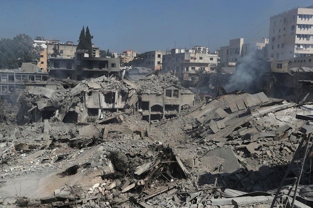 Destroyed shops and buildings at commercial street that hit Saturday night by Israeli airstrikes, in Nabatiyeh town, south Lebanon, Sunday, October 13, 2024 (AP)