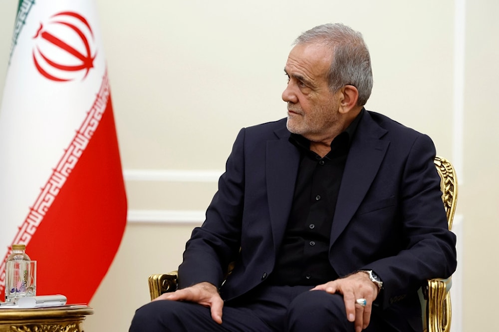 Iranian President Masoud Pezeshkian listens to Russian Prime Minister Mikhail Mishustin during their talks in Tehran, Iran, Monday, September 30, 2024 (AP)