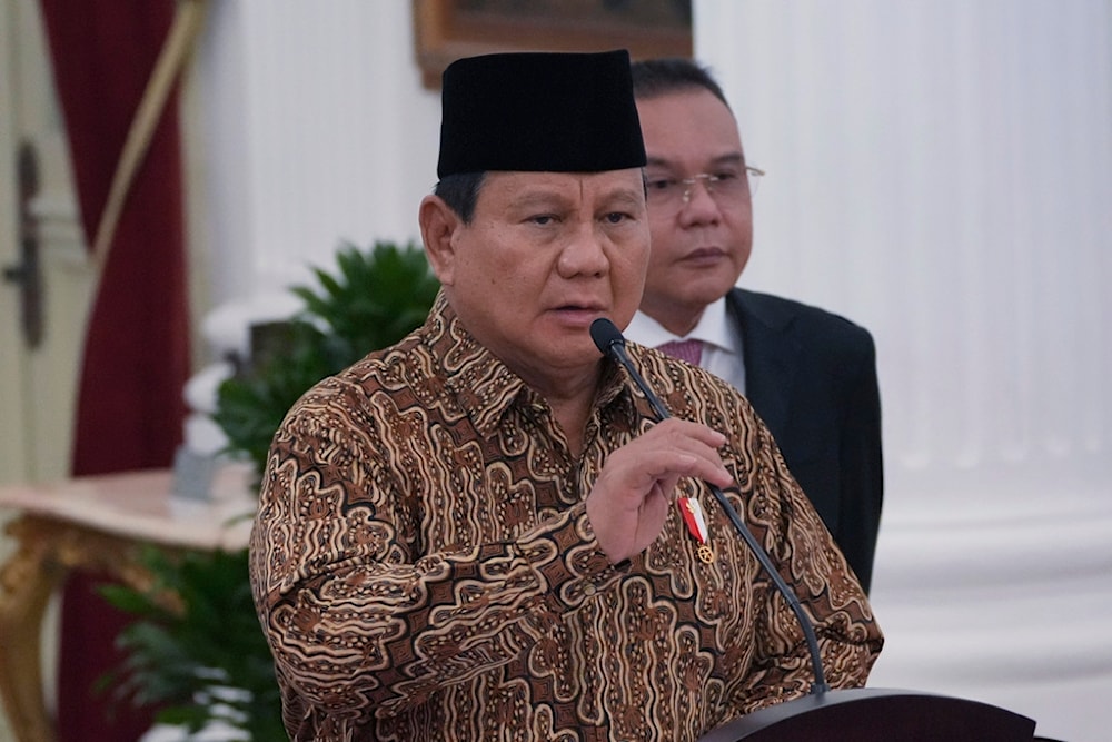 Indonesia's new President Prabowo Subianto speaks s he announces his cabinet lineup at Merdeka Palace in Jakarta, Indonesia, Sunday, Oct. 20, 2024. (AP Photo/Achmad Ibrahim)