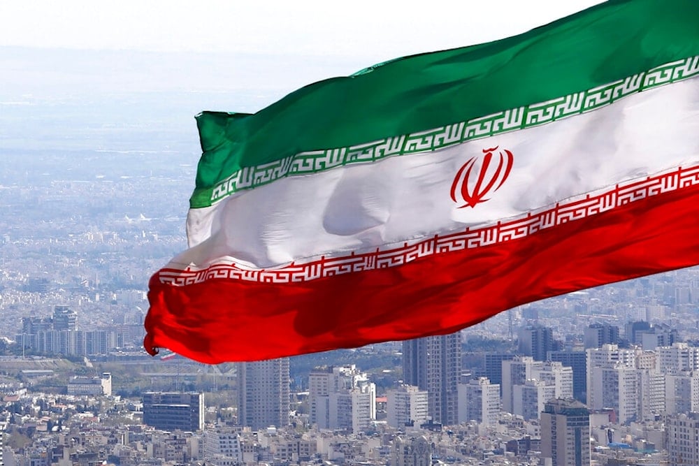 Iran's national flag waves in Tehran, Iran, March 31, 2020. (AP)