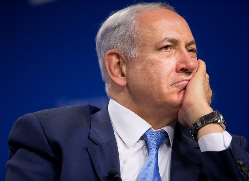 Israeli Prime Minister Benjamin Netanyahu listens to a question from a member of the audience at the Center for American Progress in Washington, on November 10, 2015. (AP)