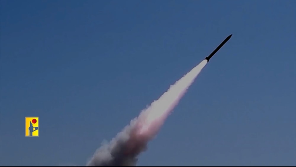 A cinematic video released by the Islamic Resistance in Lebanon's Militay Media Unit shows a medium range rocket artilley shell being fired at a target. (Islamic Resistance in Lebanon/ Military Media)