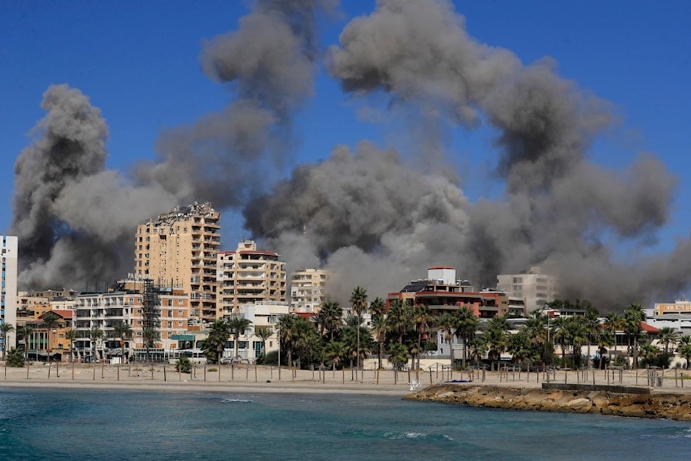 Smoke rises from buildings hit in Israeli airstrikes in Tyre, Lebanon, Wednesday, Oct. 23, 2024 