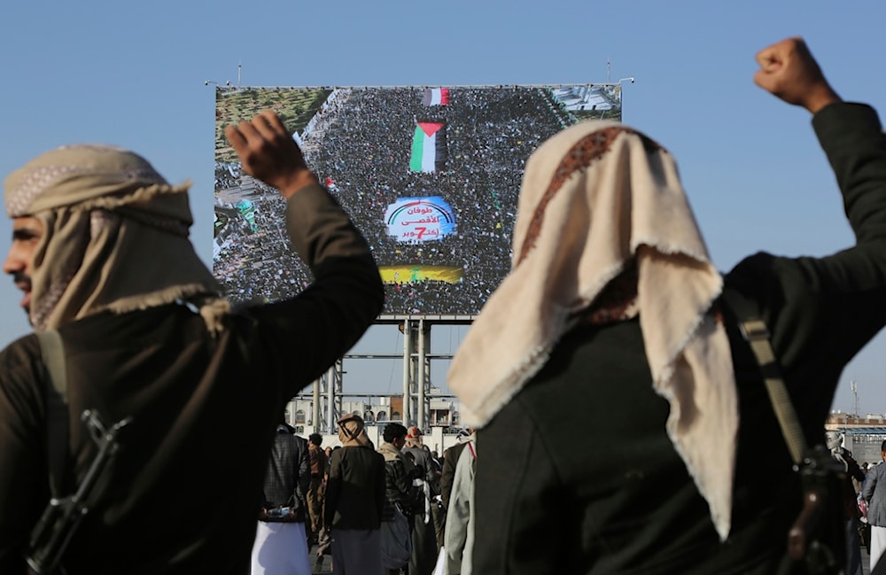 Yemenis shout slogans during a rally to commemorate the one-year anniversary of the war in the Gaza Strip, in Sanaa, Yemen, October 7, 2024 (AP)