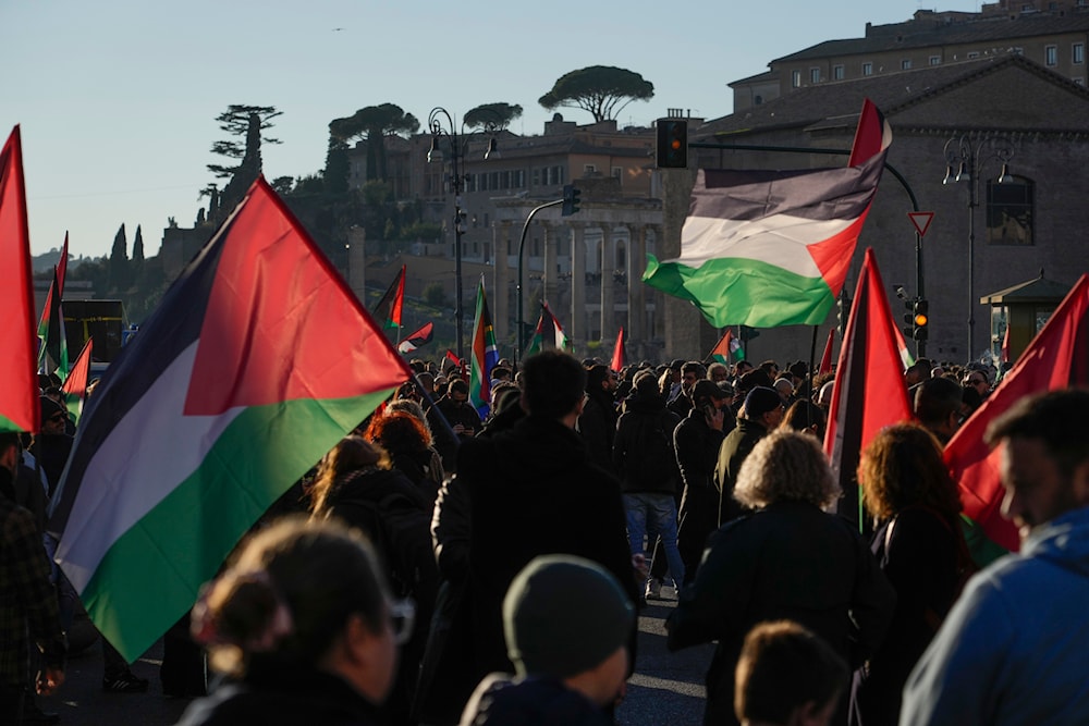 Protesters gather during a rally in support of the Palestinians in Rome, on January 13, 2024. (AP)