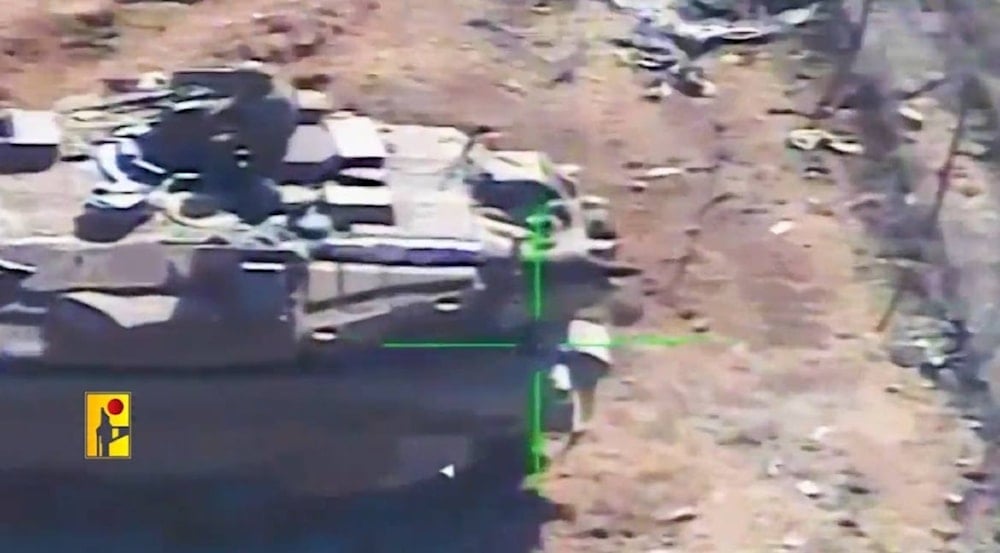 Screengrab of footage released by Hezbollah showing the targeting of a Merkava tank along the Lebanese border on October 19, 2024. (Resistance media) 