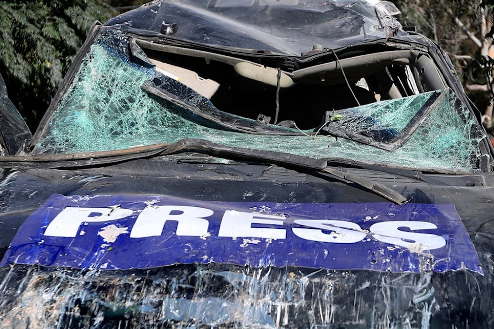 A destroyed journalists car is seen at the site where an Israeli airstrike hit a compound housing journalists in Hasbaya village, southeast Lebanon, Friday, October 25, 2024 (AP)