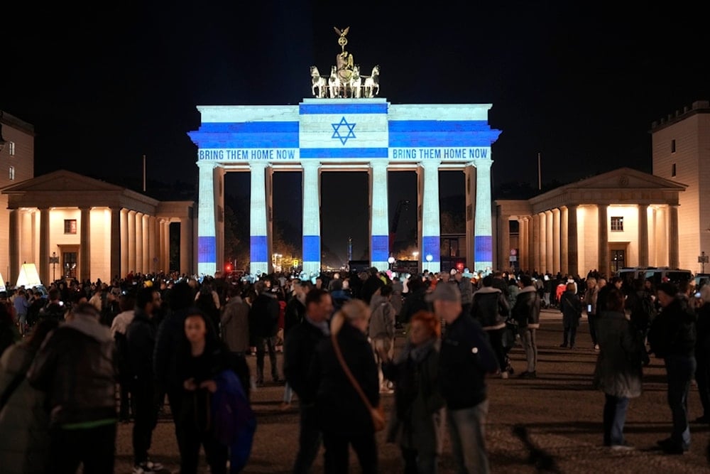 The Brandenburg Gate is illuminated in solidarity with Israel, marking the first anniversary of the Hamas spearheaded attacks on Israel, in Berlin, Germany, Monday, Oct. 7, 2024. (AP)