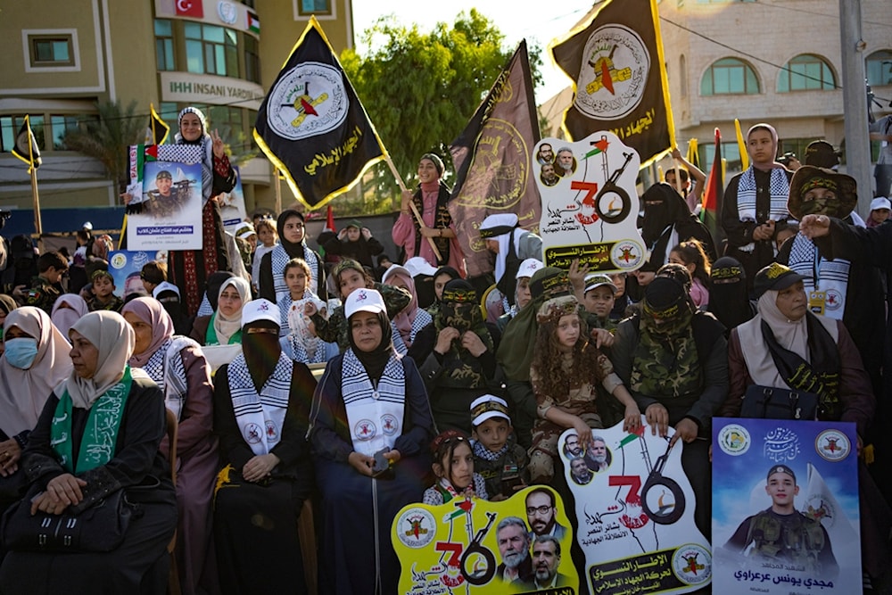 Palestinian Islamic Jihad (PIJ) supporters attend a rally marking the 36th anniversary of the movement's foundation in Gaza City on Friday, October 6, 2023 (AP)