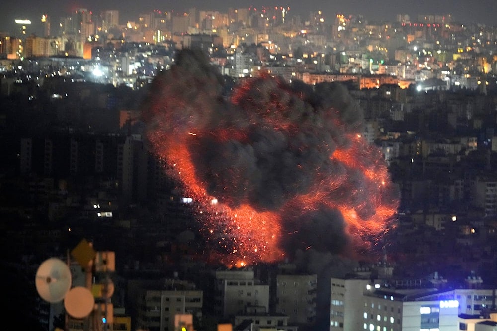 Flame and smoke rises from an Israeli airstrike on Dahiyeh, in the southern suburb of Beirut, Lebanon, on October 27, 2024. (AP)