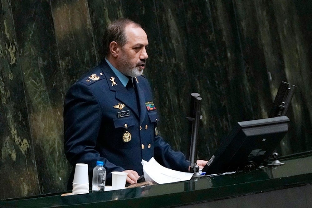 Iran's Defense Minister Gen. Aziz Nasirzadeh, prior to appointment, speaks during an open session of parliament on the third day, in Tehran, Iran, Monday, Aug. 19, 2024.(AP)