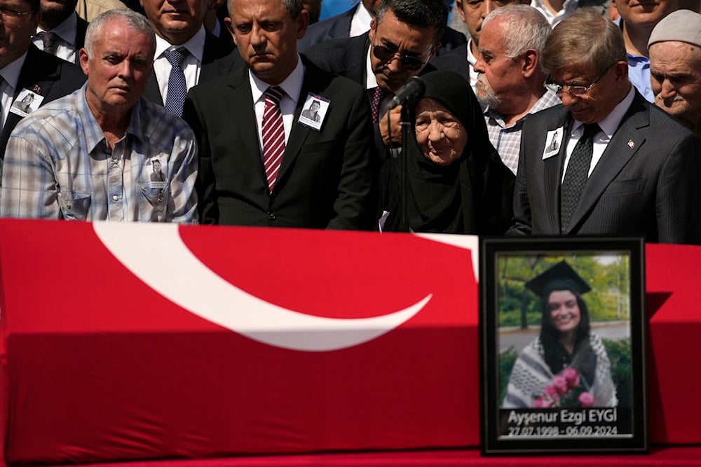 Mehmet, left. the father of Aysenur Ezgi Eygi, a 26 year-old Turkish-American activist killed by the Israeli military, attends prayers during his daughter's funeral outside the central mosque of Didim, Turkey, Saturday, Sept. 14, 2024,(AP)