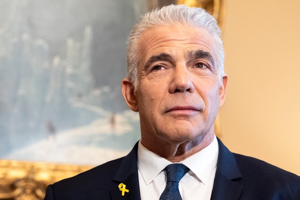 Israeli occupation Opposition Leader Yair Lapid meets with Senate Majority Leader Chuck Schumer of N.Y., April 9, 2024, on Capitol Hill in Washington, US. (AP)