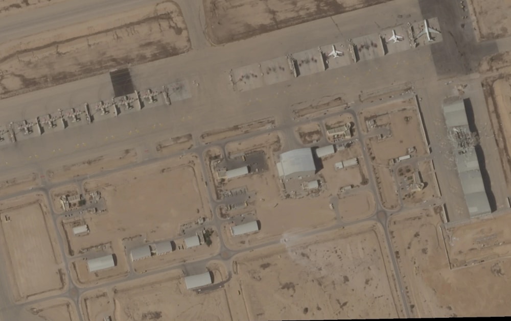 Satellite images showing the Nevatim air base following Operation True Promise 2 on October 1, 2024. (Planet Labs PBC via AP)