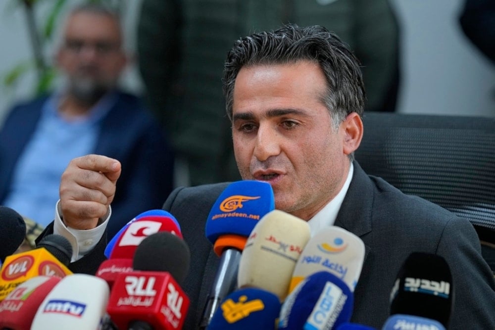 Lebanese caretaker Minister of Public Works and Transportation Ali Hamieh speaks during a press conference at the Rafik Hariri International Airport in Beirut, Lebanon, Monday, Jan. 8, 2024 (AP)