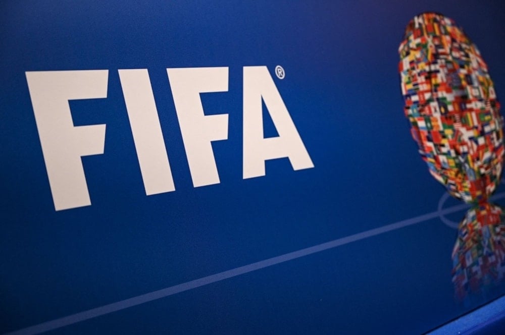 The FIFA logo is seen at a press event in Istanbul, Turkey on August 15,2022. (AFP)