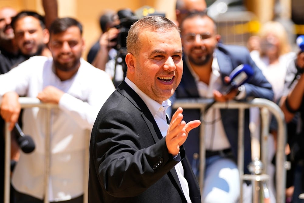 Lebanese lawmaker Hassan Fadlallah leaves the parliament building after he attends a parliament session in Beirut, Lebanon, on June 14, 2023. (AP)