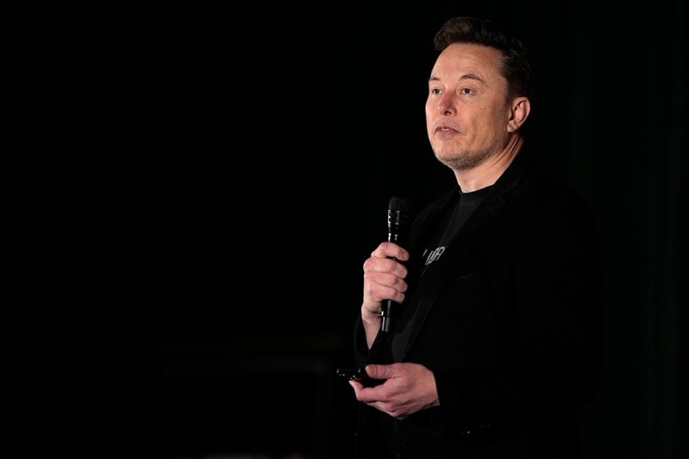 Elon Musk speaks as part of a campaign town hall in support of Republican presidential nominee former President Donald Trump in Folsom, Pa., Thursday, Oct. 17, 2024. (AP Photo/Matt Rourke)