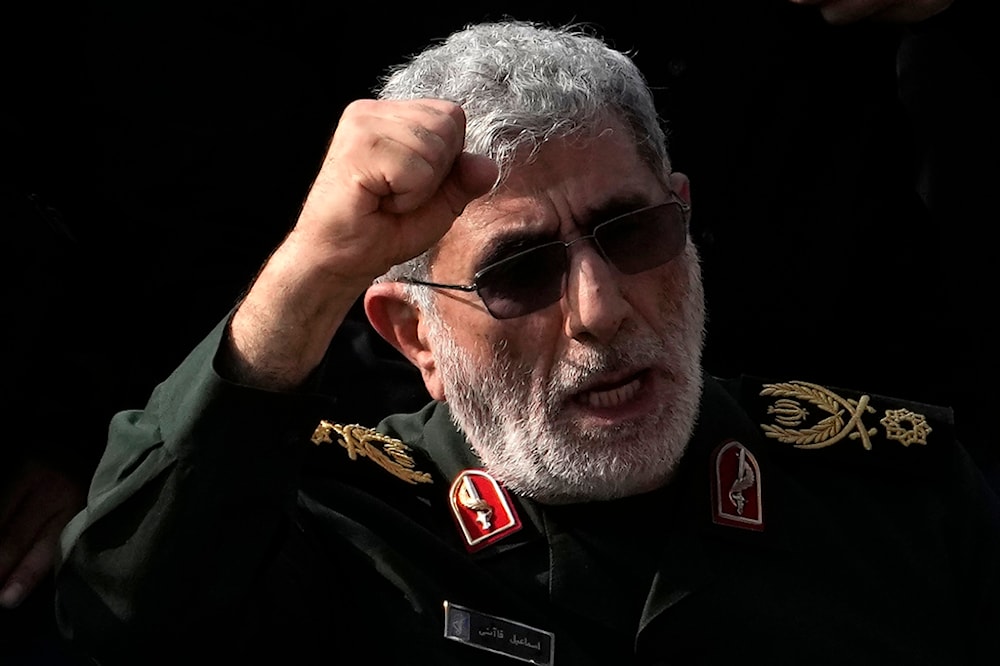 Commander of Iran's Revolution Guard Quds Force, Brig. Gen. Esmail Qaani, chants a slogan 