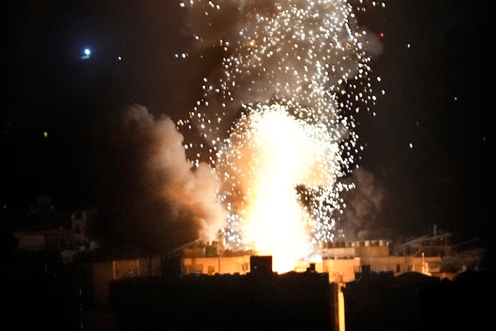 Flames and smoke rise from an Israeli occupation airstrike in Southern Suburbs of Beirut (Dahiyeh), Lebanon, early Sunday, Oct. 6, 2024. (AP)