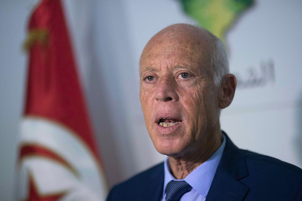 Tunisian former conservative constitutional law professor Kais Saied stands in his office in Tunis, Tunisia, Tuesday, Sept. 17, 2019. (AP)