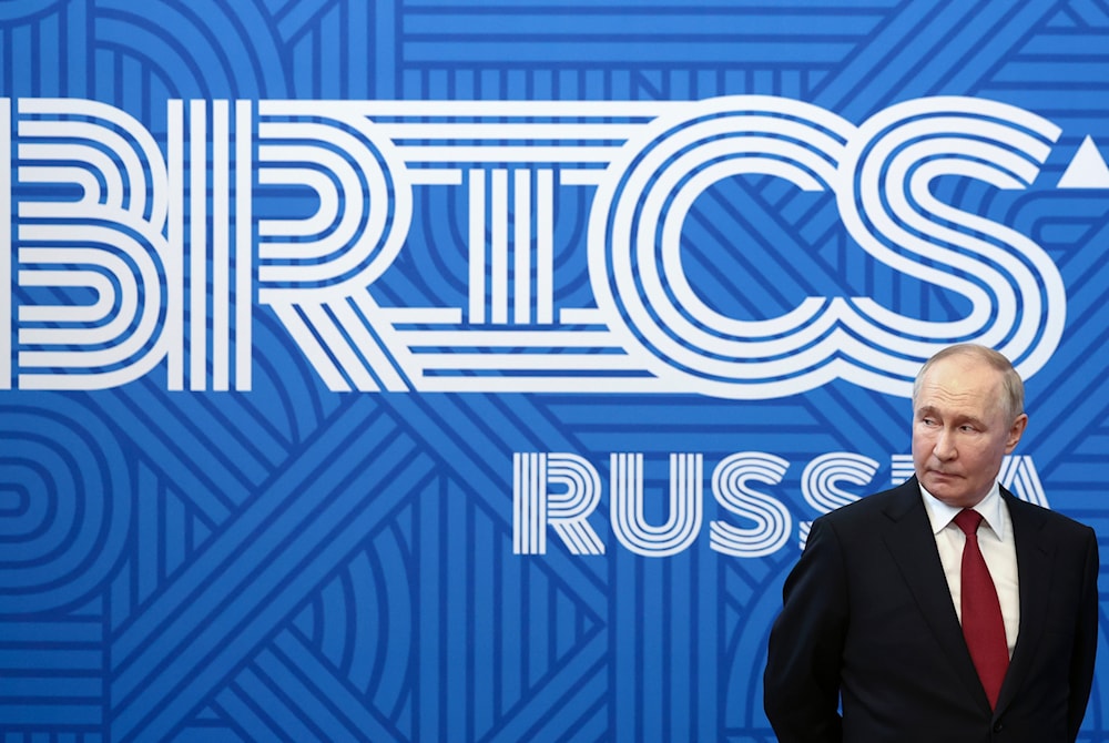 Russian President Vladimir Putin awaits his meeting with Iranian Parliament speaker Mohammad Bagher Ghalibaf on the sidelines of the BRICS Parliamentary Forum in St. Petersburg, Russia, on July 11, 2024. (AP)