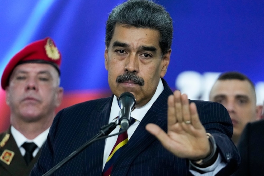  Venezuelan President Nicolas Maduro speaks to the press before leaving the Supreme Court in Caracas, Venezuela, on Friday August 9,2024. (AP)