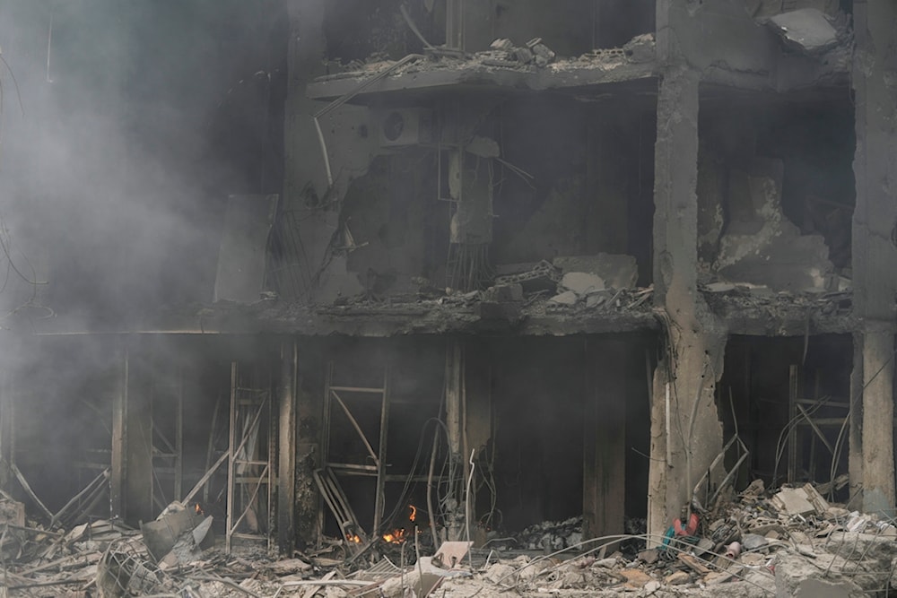 Smoke rises from destroyed buildings at the site of an Israeli airstrike hit in Choueifat, southeast of Beirut, Lebanon, Monday, Oct. 7, 2024. (AP)