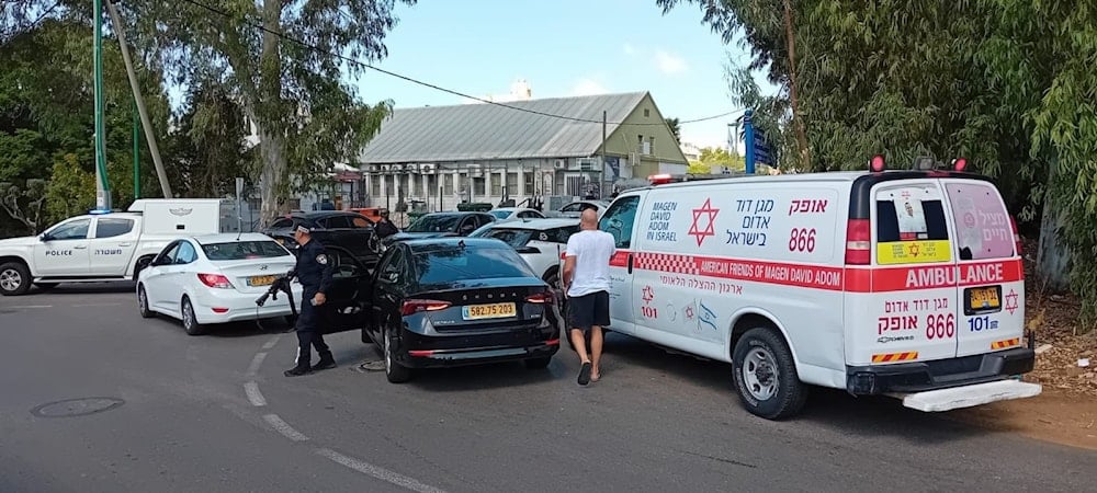 Red Star of David and Israeli police come to the scene of the stabbing operation in north Tel Aviv on October 9, 2024. (Social media)