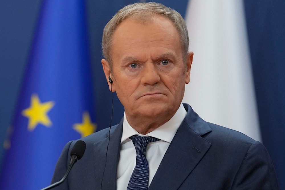 Poland's Prime MInister Donald Tusk listens to Serbian President Aleksandar Vucic during a news conference in the Serbia Palace in Belgrade, Serbia, Thursday, Oct. 24, 2024. (AP)