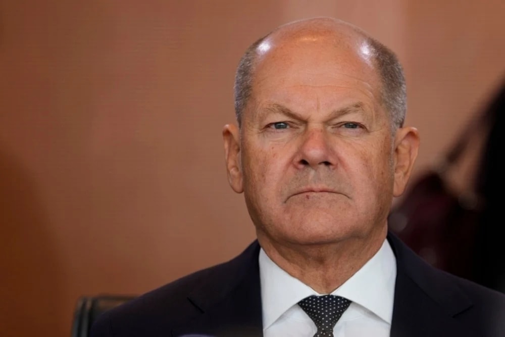 German Chancellor Olaf Scholz arrives for the cabinet meeting of the government at the chancellery in Berlin, Germany, Wednesday, Oct. 9, 2024. (AP)