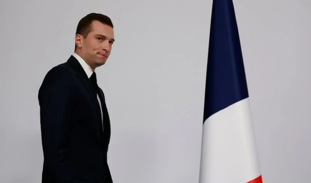 Far-right National Rally Party President Jordan Bardella arrives to deliver his speech after the first round vote of the legislative election on Sunday June 30,2024, in Paris. (AP)