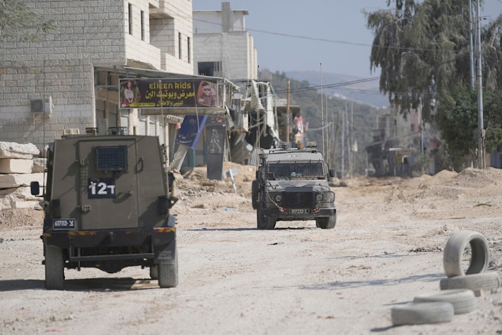 Israeli occupation forces during an invasion into Nur Shams camp, in the occupied West Bank city of Tulkarem, Oct. 31, 2024. (AP)