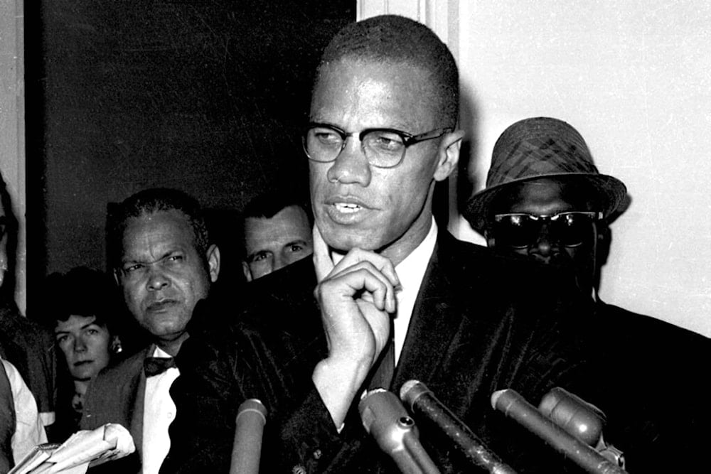 Malcolm X speaks to reporters in Washington, D.C., May 16, 1963. (AP)