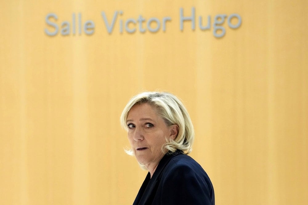 French right-wing leader Marine Le Pen arrives at the courtroom for the trial over the suspected embezzlement of European Parliament funds, Wednesday, Nov. 6, 2024 in Paris. (AP)