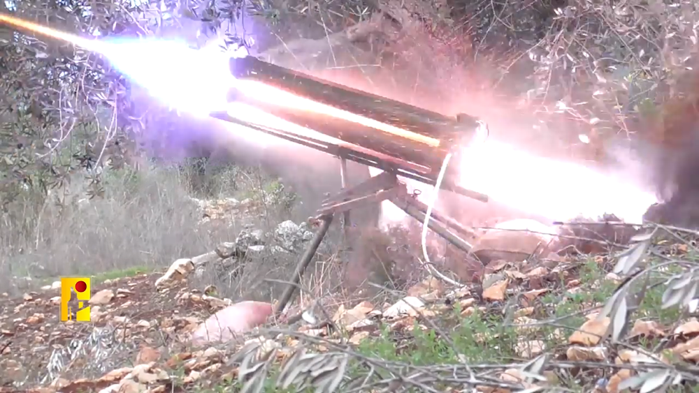 A Hezbollah fighter launches rockets toward the Yifath Barracks in northern occupied Palestine on November 15, 2024 (Islamic Resistance Military Media)