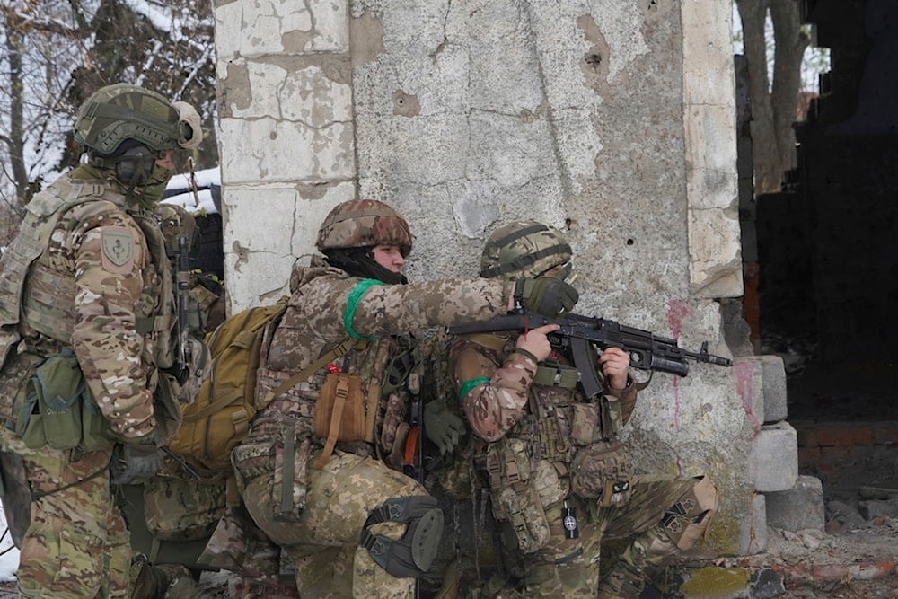 Ukrainian servicemen of 57th motorised brigade improve their tactical skills on obstacle course at the training field in Kharkiv region, Ukraine Thursday, Nov. 14, 2024. (AP)