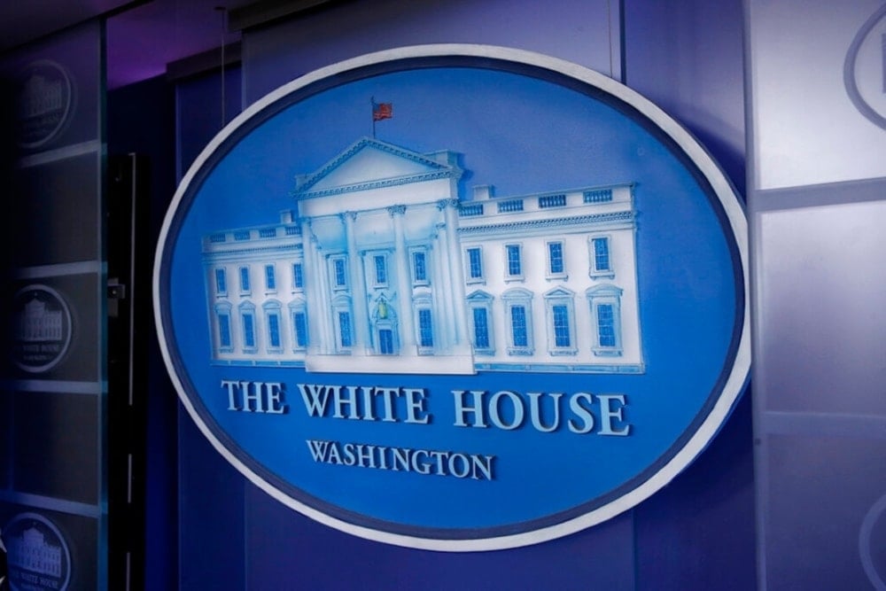 A plaque depicting the White House is posted behind a podium in the James Brady Press Briefing Room of the White House, Sunday, March 22, 2020, in Washington. (AP)