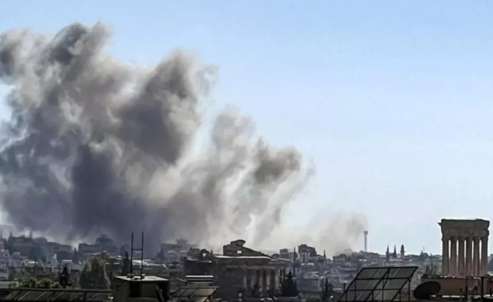 Smoke billows from the site of an Israeli airstrike that targeted Lebanon's eastern city of Baalbeck in the Bekaa valley on September 25, 2024. (AFP)