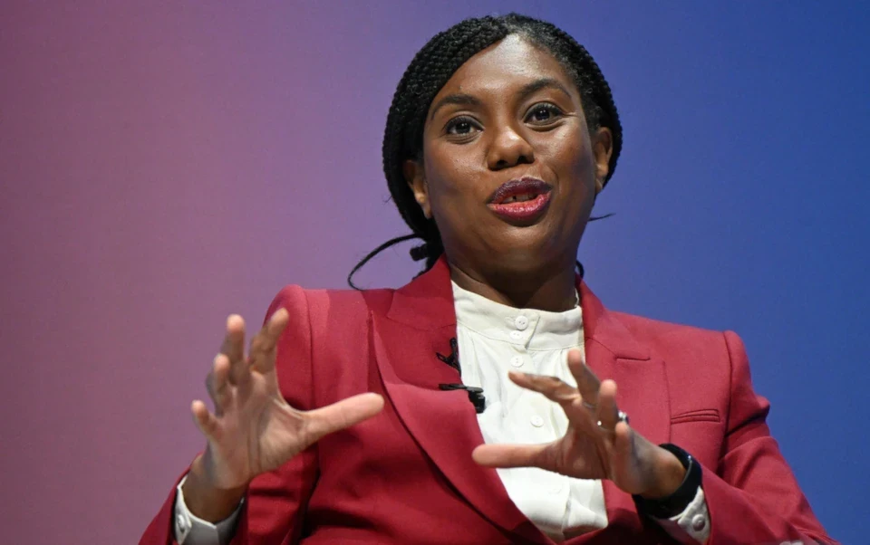 Kemi Badenoch speaking at a press conference (AFP via Getty Images)