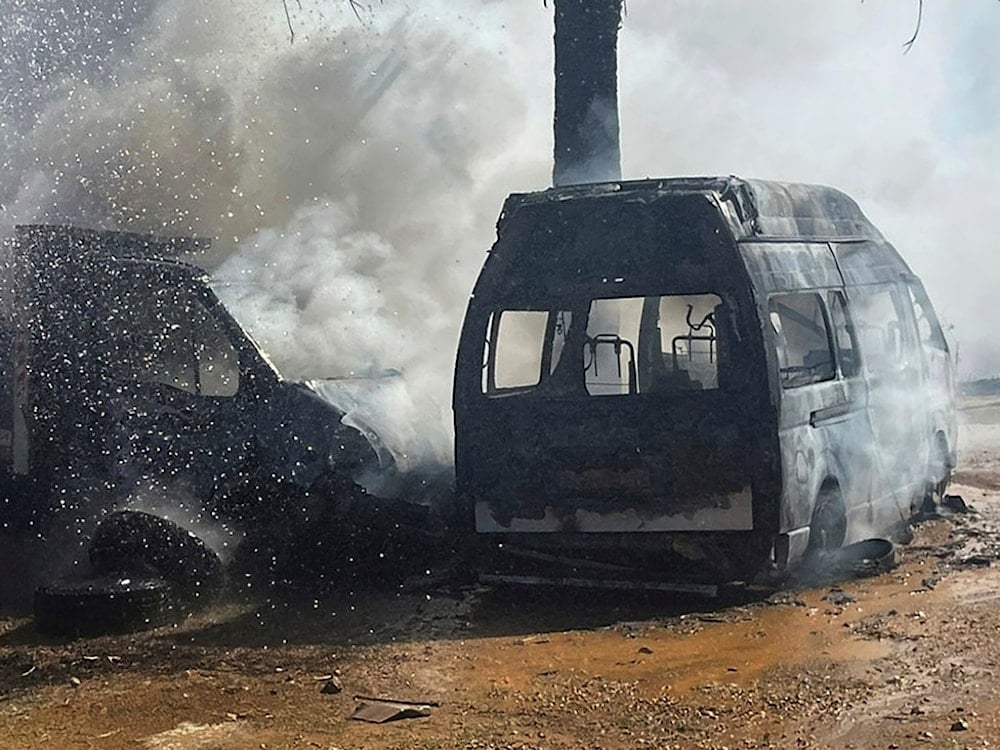 A truck and ambulance burn after Israeli airstrikes hit a group of paramedics outside a hospital in Marjayoun, south Lebanon, Friday, Oct. 4, 2024. (AP)