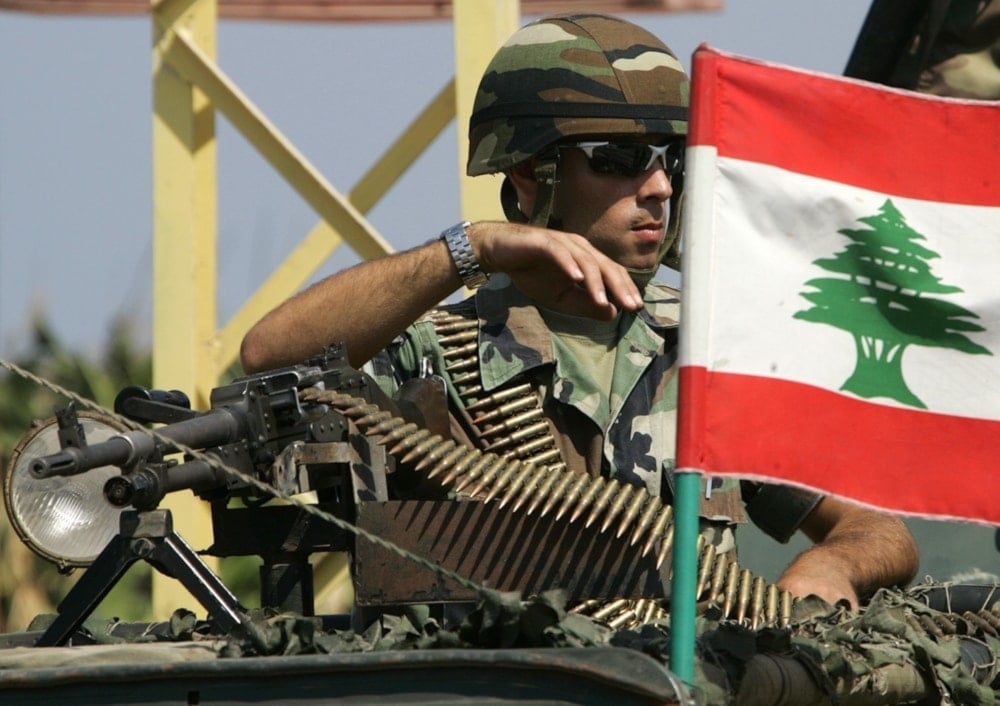 A Lebanese soldier manning a machine gun, Tyre, Lebanon, Saturday, September 16,2006. (AP)