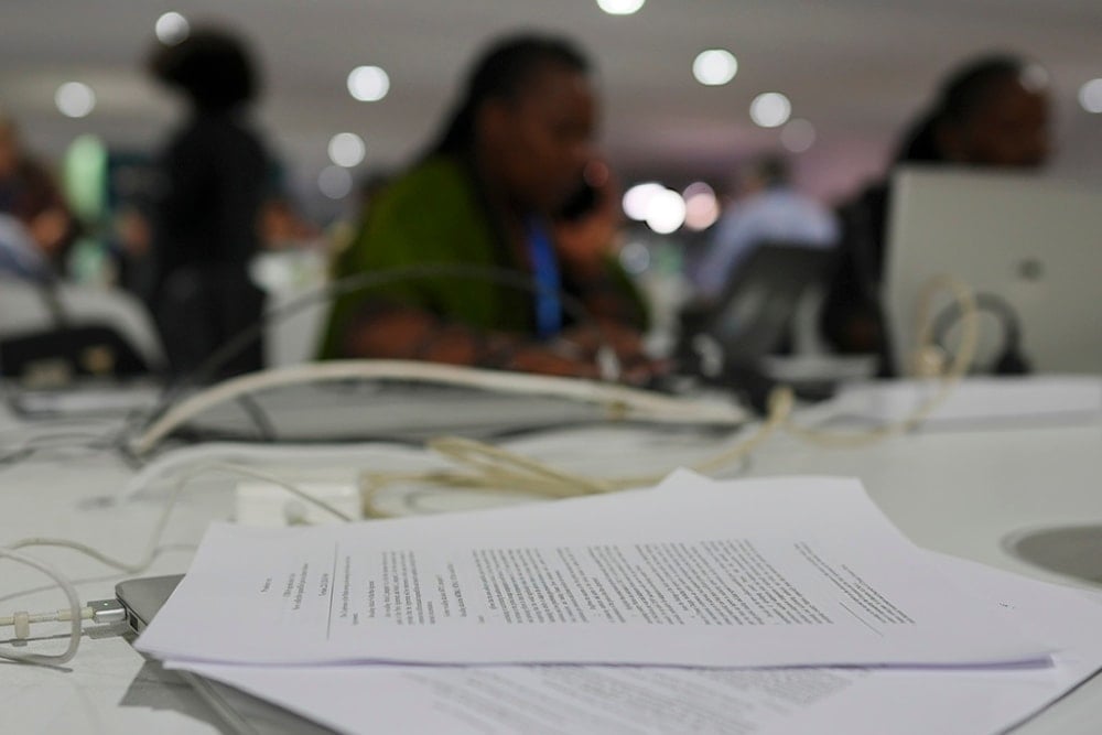 A draft of a proposed deal for curbing climate change sits on a table at the COP29 UN Climate Summit, Friday, Nov. 22, 2024, in Baku, Azerbaijan. (AP Photo/Peter Dejong)