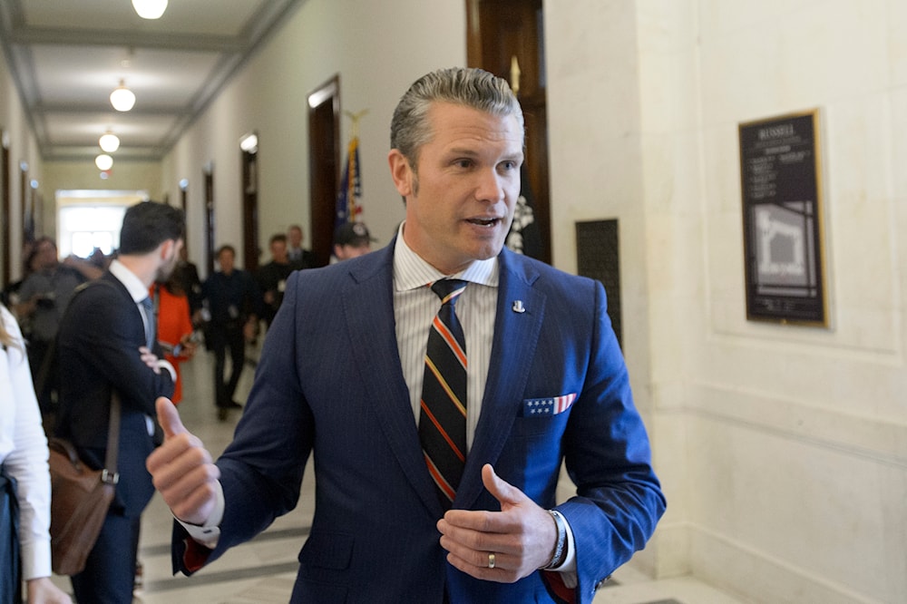 Pete Hegseth, President-elect Donald Trump's pick for secretary of defense, speaks with reporters following a meeting with senators on Capitol Hill, on November 21, 2024, in Washington. (AP)