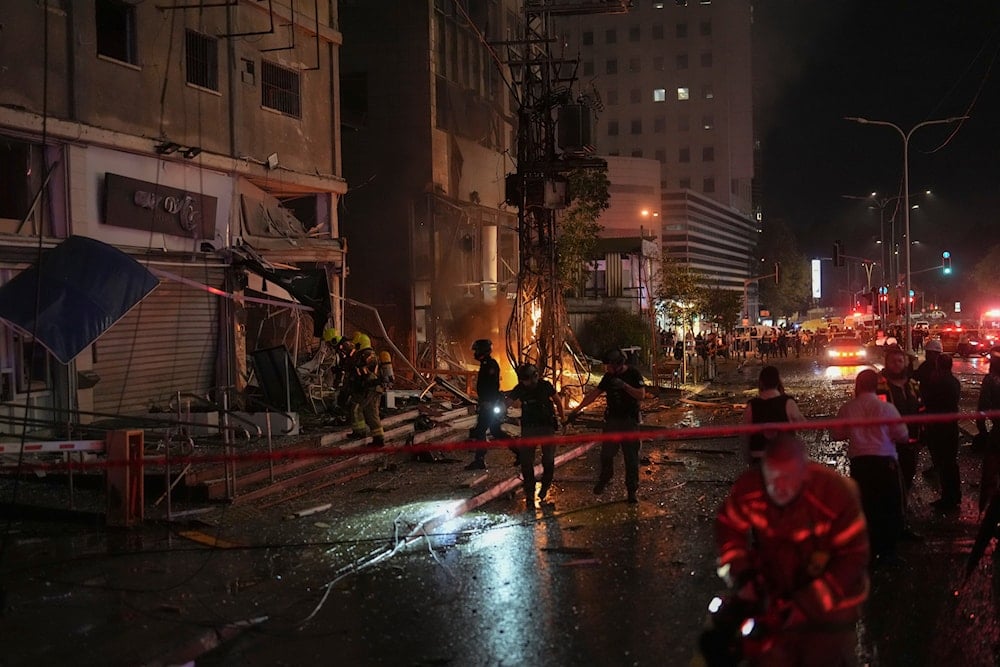 Security forces cordon and inspect the location after a rocket attack in Ramat Gan, 'Tel Aviv' on November 18, 2024. (AP)