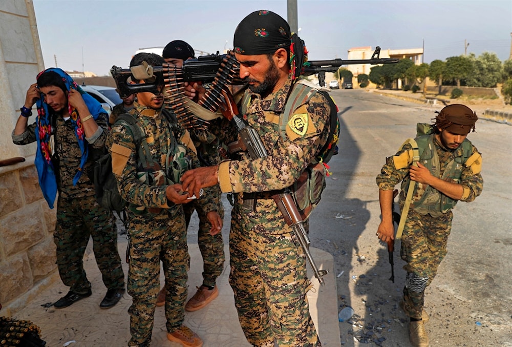 US-backed Syrian Democratic Forces (SDF) fighters are pictured in Raqqa, northeast Syria, on June 22, 2017.