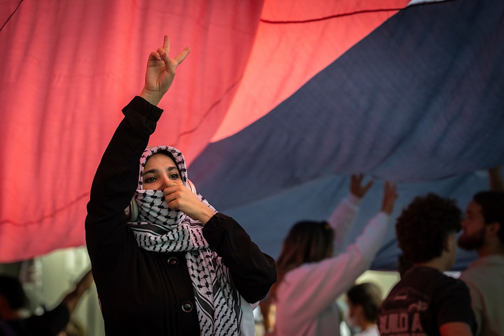 Protestors demonstrate near City Hall during a pro-Palestinian protest, on October 7, 2024, in New York. (AP)